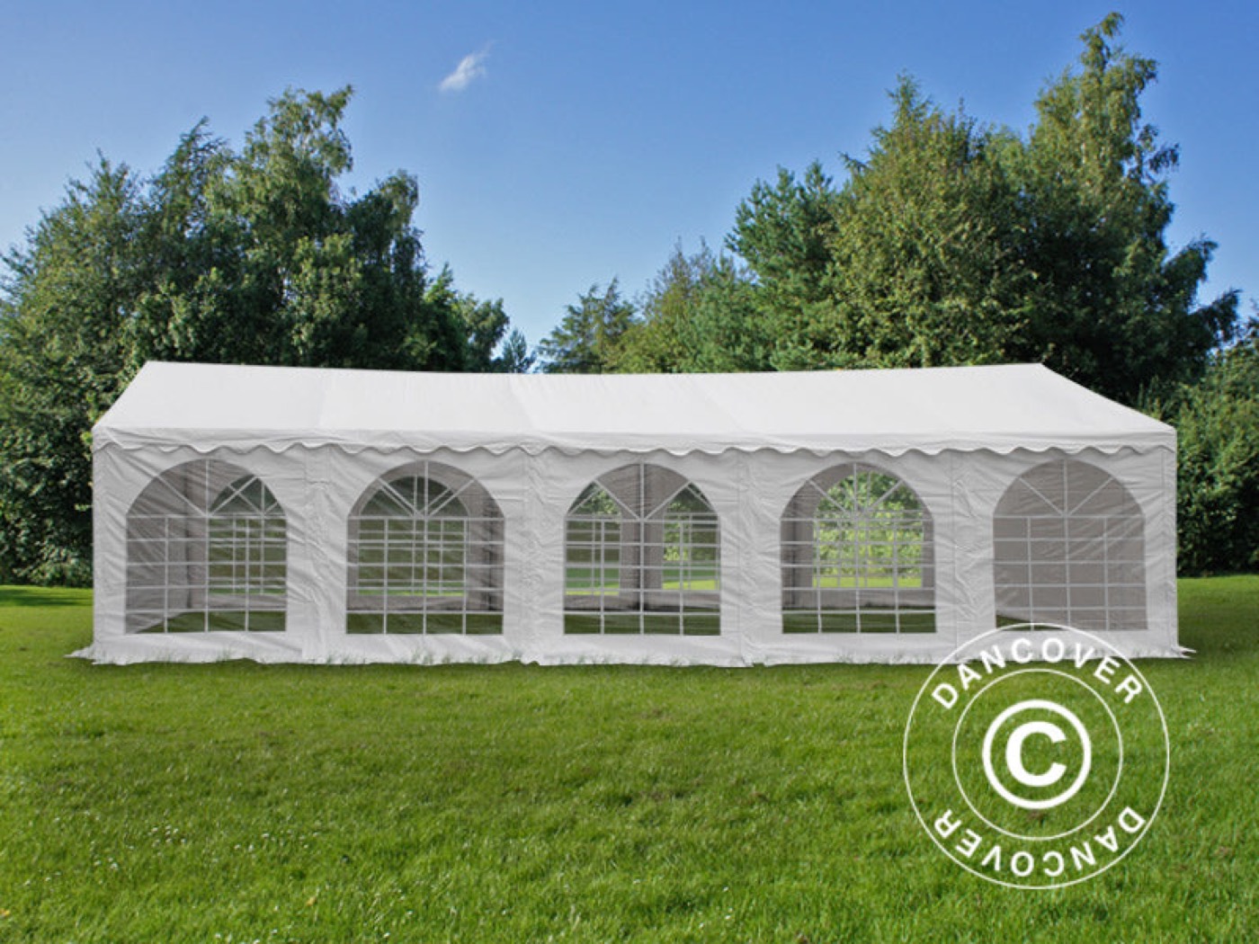 Large white party tent with arched windows