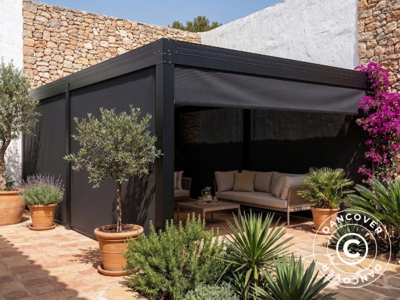 Dark grey side walls mounted on a black Monterey pergola over a terrace lounge
