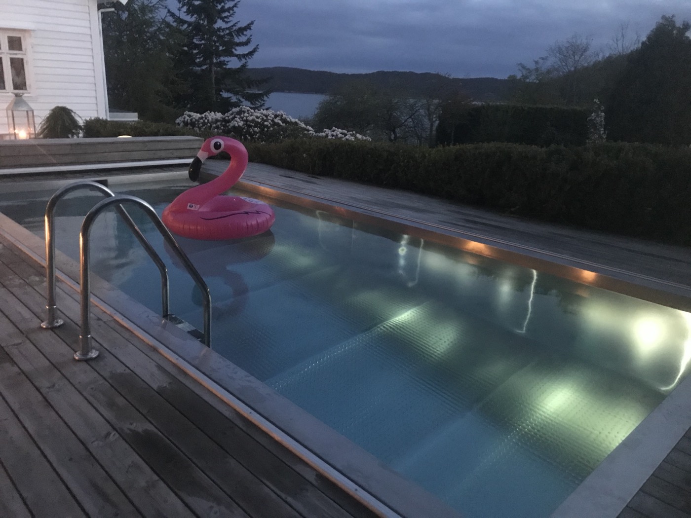 Stainless steel pool on a terrace above a fjord